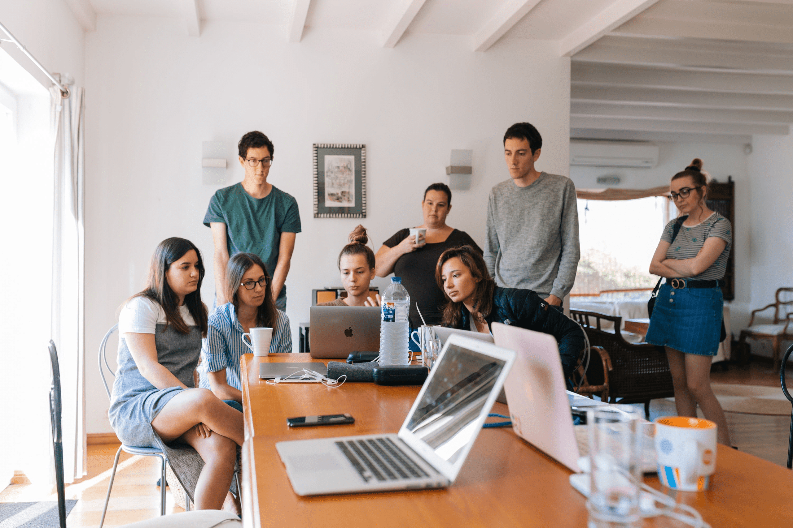People interacting with a product, discussing their experience